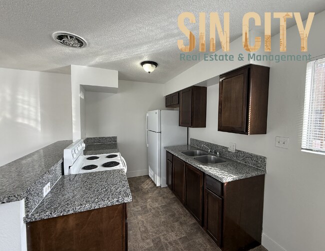 Building Photo - "Chic 1-Bed Oasis with Granite Elegance in Vibrant Las Vegas!"
