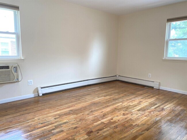 Building Photo - 209-11-209-41 41st Ave