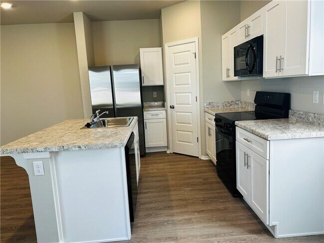 Building Photo - 6821 Devotion Ave