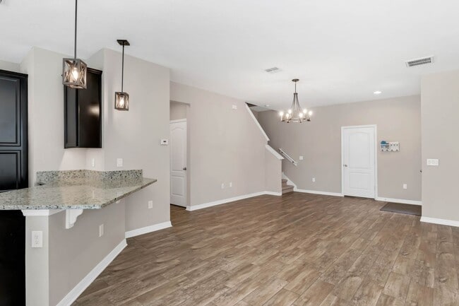 Building Photo - Spacious, Nearly New and Gated 3/2.5/2 Plu...