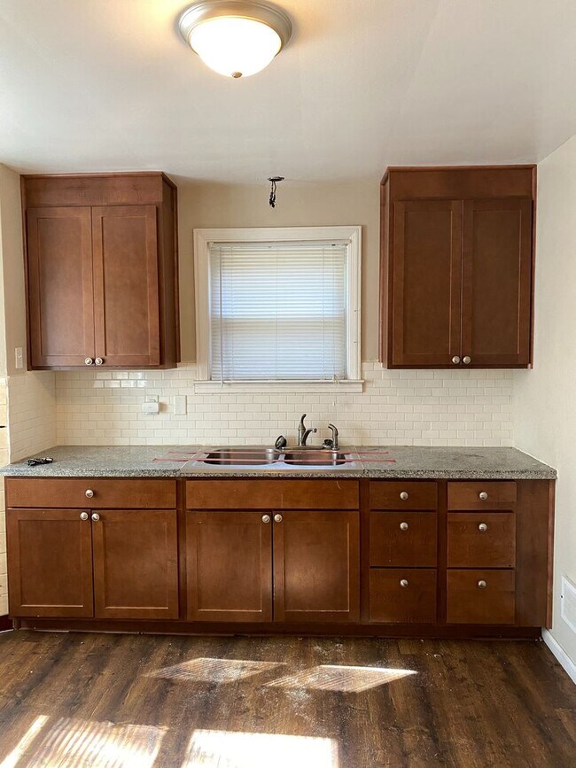 Building Photo - BRICK COLONIAL HOME COMING SOON! SECTION 8...