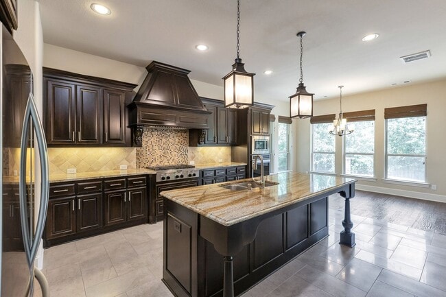 Building Photo - Grand Flower Mound home on heavily treed lot
