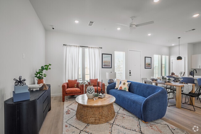 3BR, 2.5BA - 1803SF - Living Room - Oasis at Round Rock