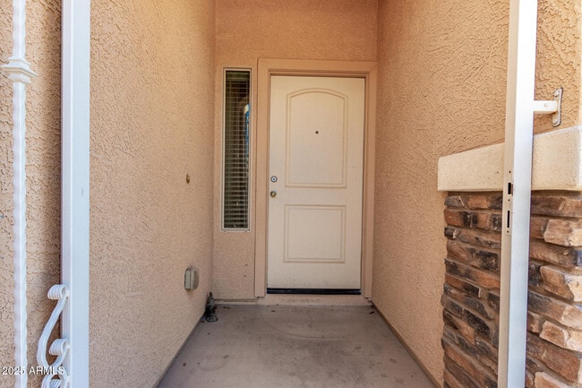 Building Photo - 9883 W Harmony Ln
