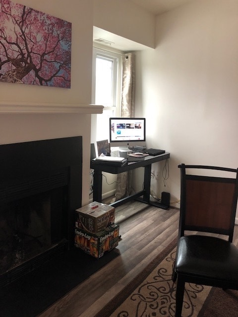 Living Room Fireplace and Desk - 1602 Berry Rose Ct