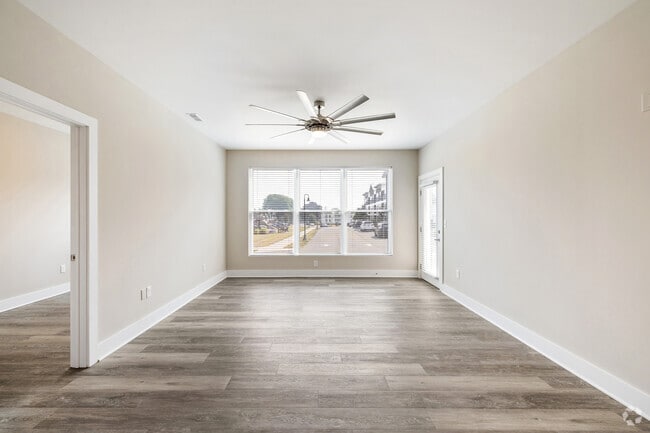 1BR, 1.5BA - 1,184SF - Living Room - Tumblerock Luxury Apartments