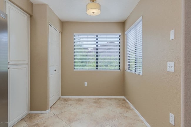 Building Photo - 9555 E Raintree Dr