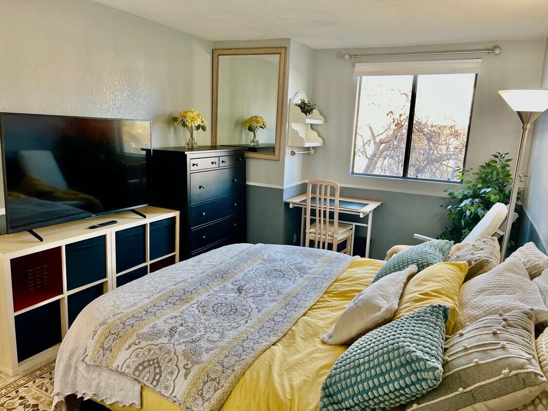 Private Bedroom with lots of storage and work space with window. - 2236 River Run Dr
