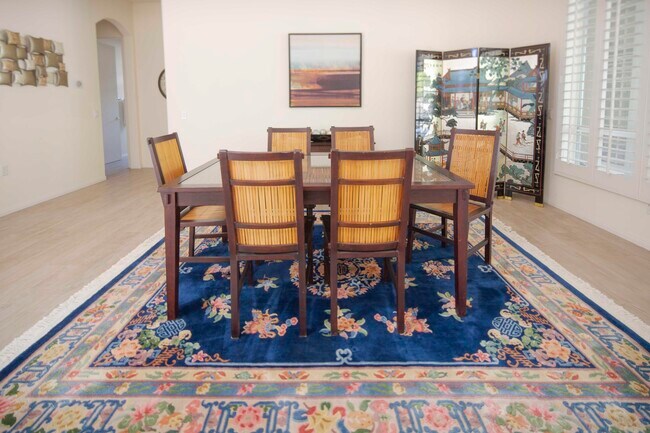 Building Photo - 38625 Desert Mirage Dr