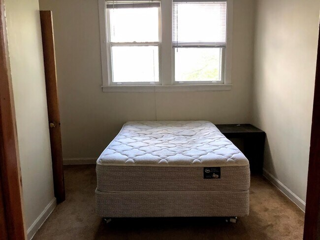 Bedroom - Carpeted, Ceiling Fan - 4056 N Menard Ave