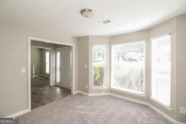 Building Photo - 6560 Commonwood Pl