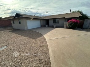 Building Photo - 8719 E Plaza Ave