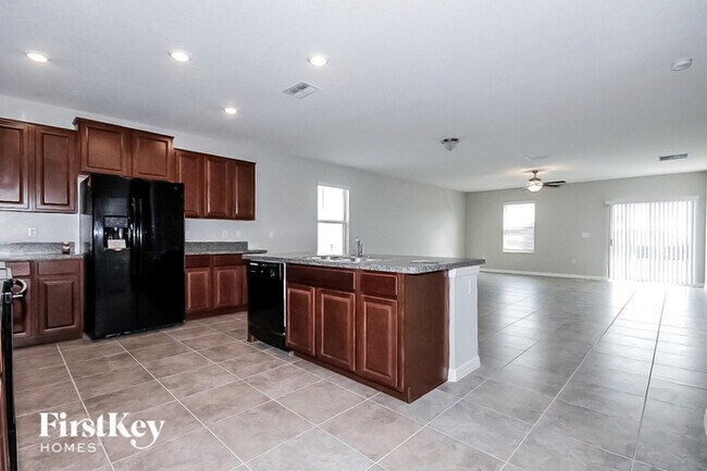Building Photo - 10111 Paradise Fish Dr