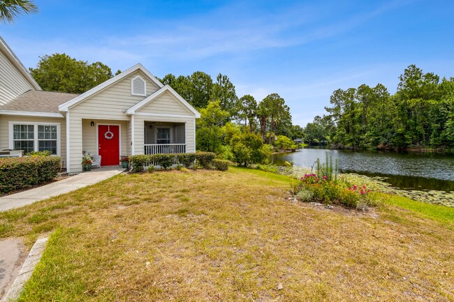 Building Photo - 2/2, Lake Front Villa! Gated Community! Op...