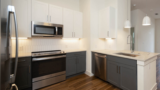 Kitchen with Stainless Steel Appliances - Olivian at the Realm