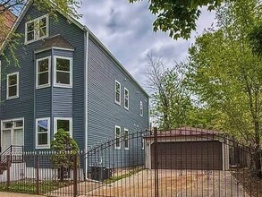 Building Photo - 6445 S Rhodes Ave