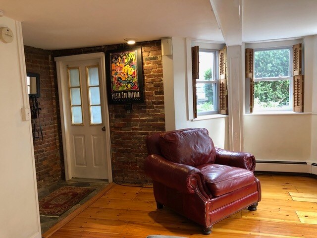 front entrance and LR bay window and leather chair - 2 Emmons Pl
