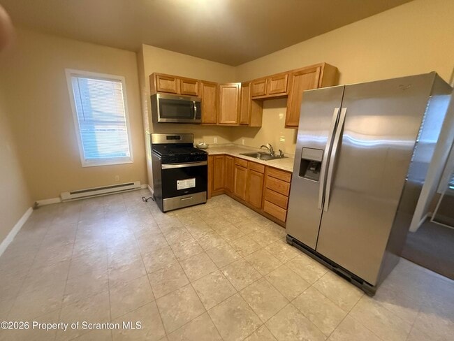 Foto del edificio - 1409 Sanderson Ave