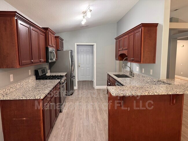 Foto del edificio - 9615 Laramie Dr