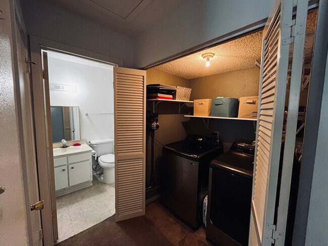 Washer & dryer + bathroom entrance - 13632 Garden Grove Ct