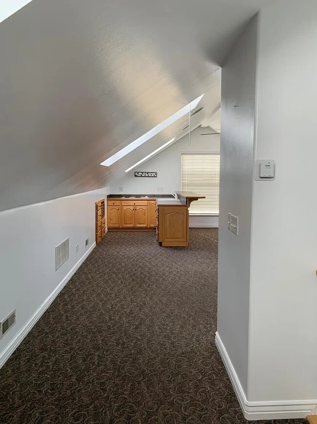 hallway to kitchen from stairs - 208 E 650 N