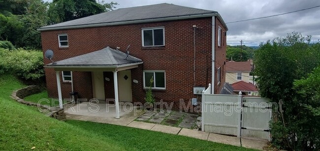 Building Photo - 5708-5708 Poketa Rd