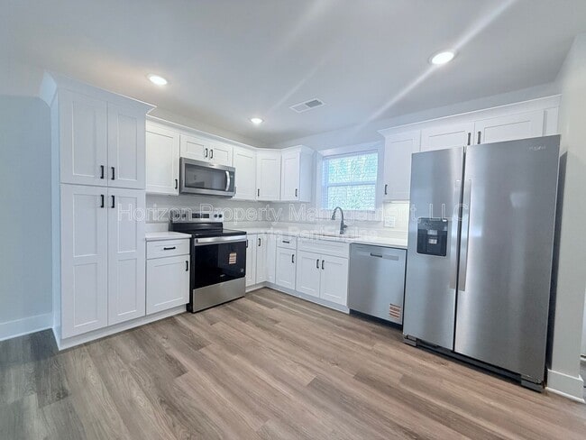 Building Photo - 7845 Wilkinson Dr