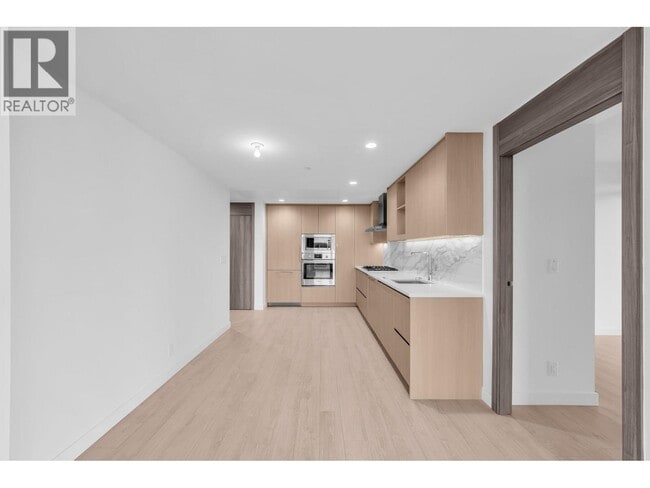 Building Photo - 4890 Lougheed Hwy.