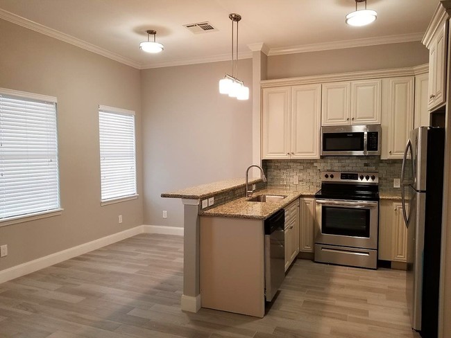 Beautiful Tiled Floors Throughout - Ocean Villa Apartment Homes