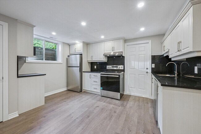 Photo du bâtiment - 7485 Hammersley Rd