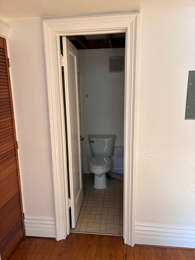 Bathroom with bathtub shower combo. - 1516 Third St
