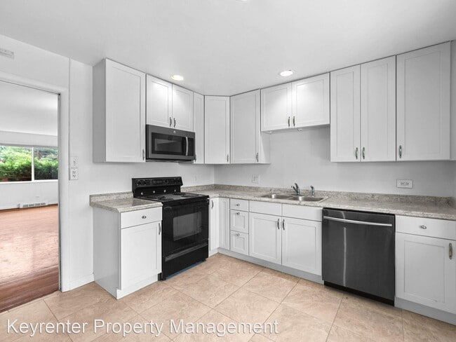 Building Photo - 4 br, 2 bath House - 130 W Midway Blvd