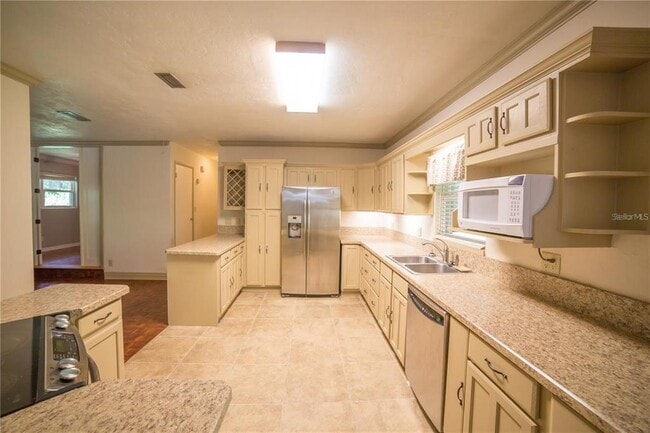 Building Photo - 1009 NW 39th Dr
