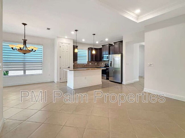 Building Photo - 9870 SW Trumpet Tree Cir