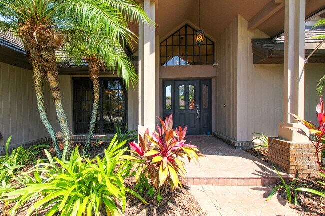 Building Photo - ** PELICAN BAY 3 BEDROOMS PLUS A DEN OR 4T...