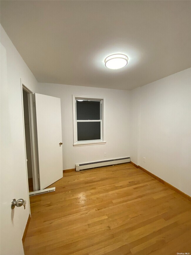 Building Photo - 121-07-121-25 25th Ave
