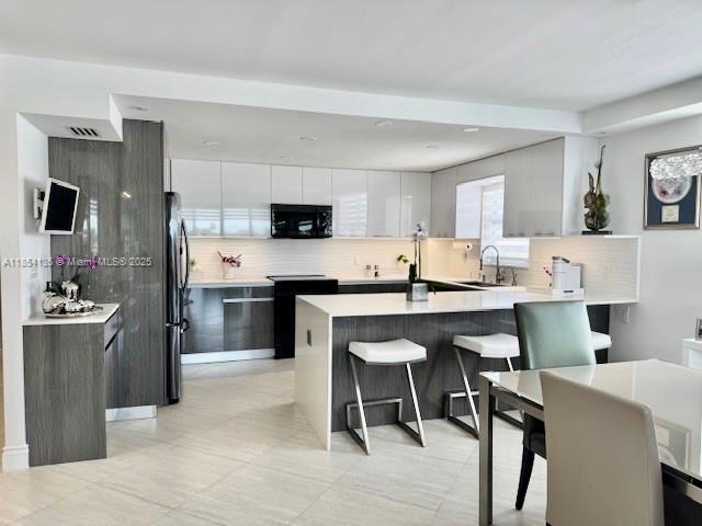 Foto principal - 9250 W Bay Harbor Dr