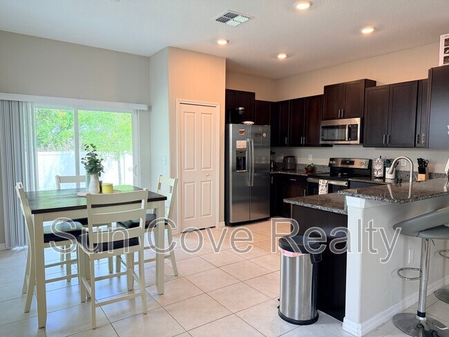 Foto del edificio - 10454 Shady Preserve Dr
