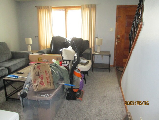 Lving room with new carpet lots of light and lots of room after moving van arrives - 3936 Liberty St
