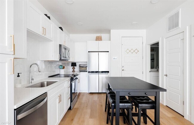 Foto del edificio - 1 br, 1 bath Condo - 2851 West 52nd Avenue...