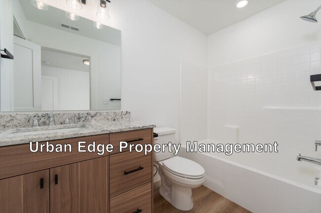 Building Photo - Move in special for July / NEW Row Home wi...