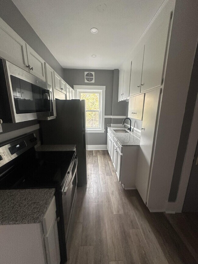 Foto del edificio - Beautiful two-bedroom home located in Roch...