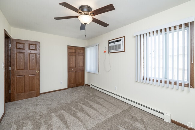 3BR, 1.5 BA - 1,060SF - Primary Bedroom - Arrowhead Apartments & Townhomes