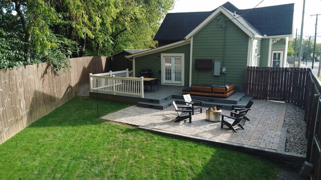 Beautiful back yard perfect for entertainment! - 1634 10th Ave N