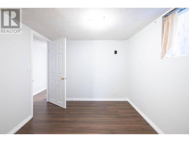 Building Photo - 153 W 64th Ave