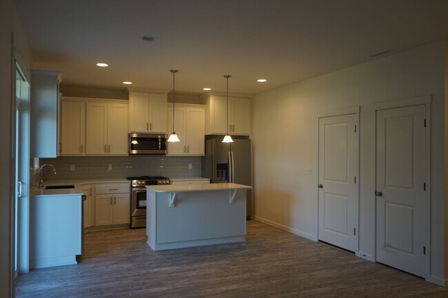 Building Photo - BRAND NEW Prairie Commons Luxury Townhome ...