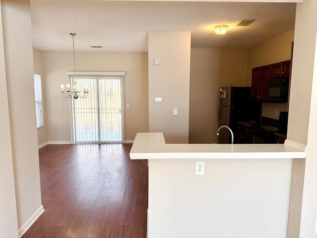 Building Photo - Welcome to this charming 2-bedroom, 2-bathroom corner townhome located in the vibrant community o...