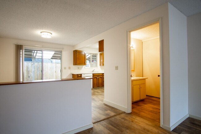 Building Photo - VERY Spacious Corner Townhouse with Private Patio, DW, W/D Hookups!