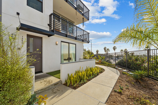Front of home - including patio and two balconies. - 1554 Vista del Mar Way