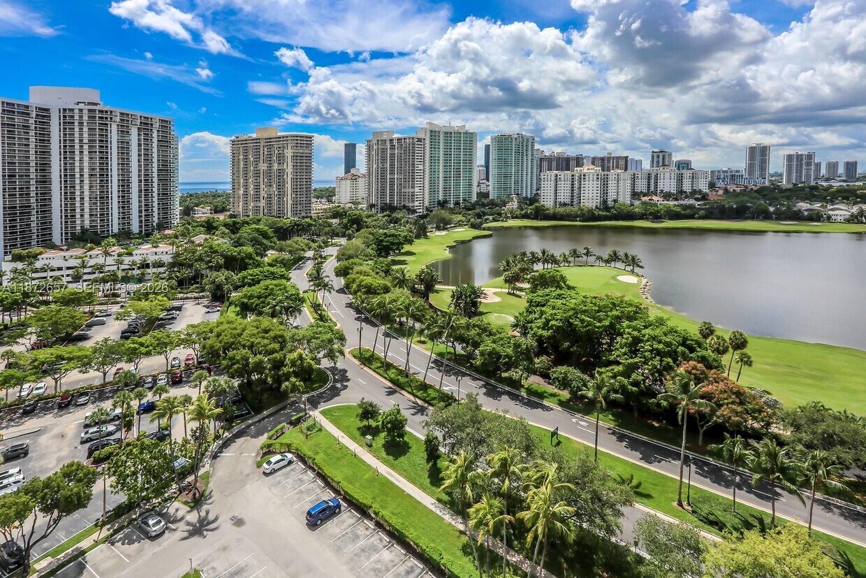 Building Photo - 3675 N Country Club Dr